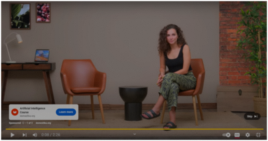 a youtube tutorial video showing a woman sitting down